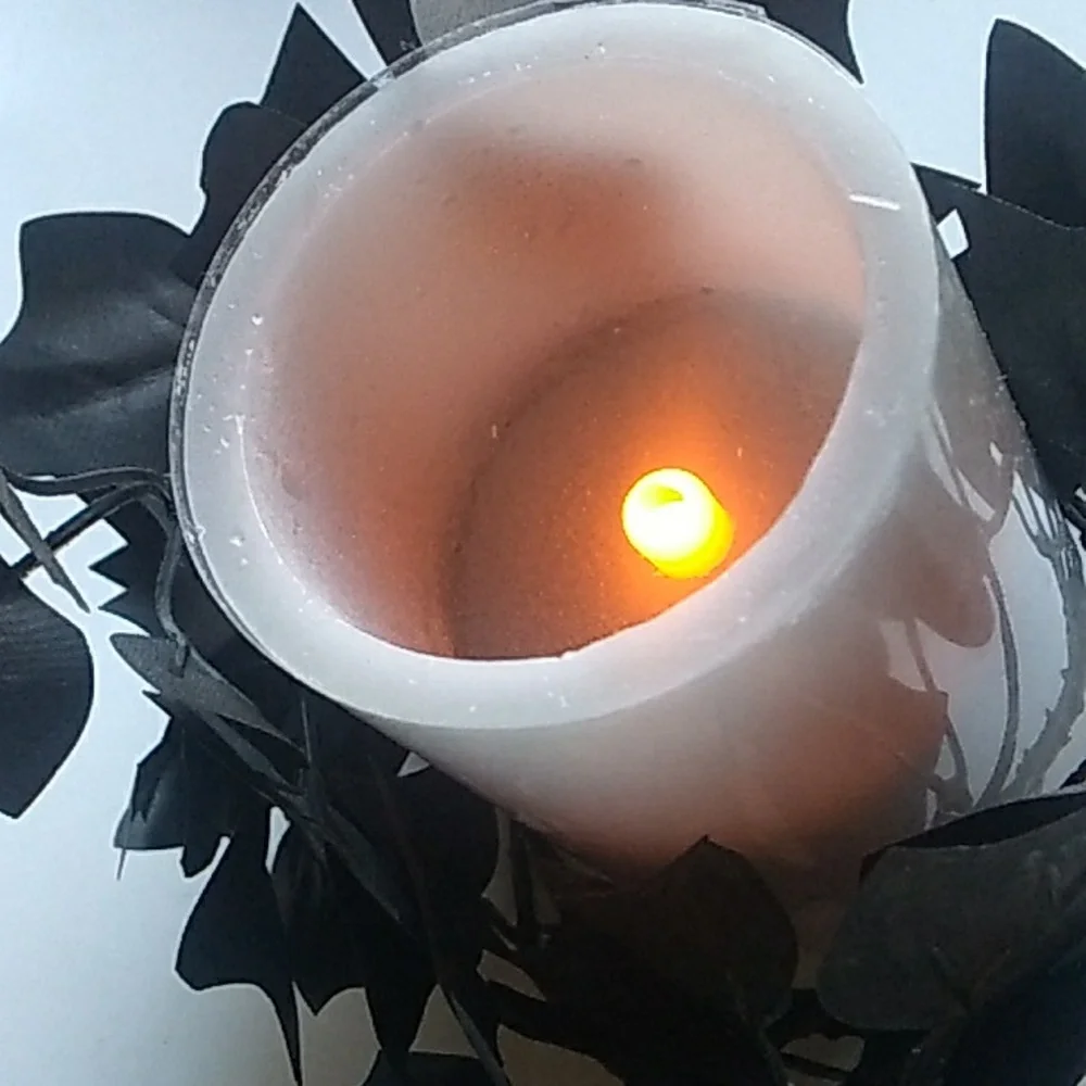 flameless gothic candle with black leaves